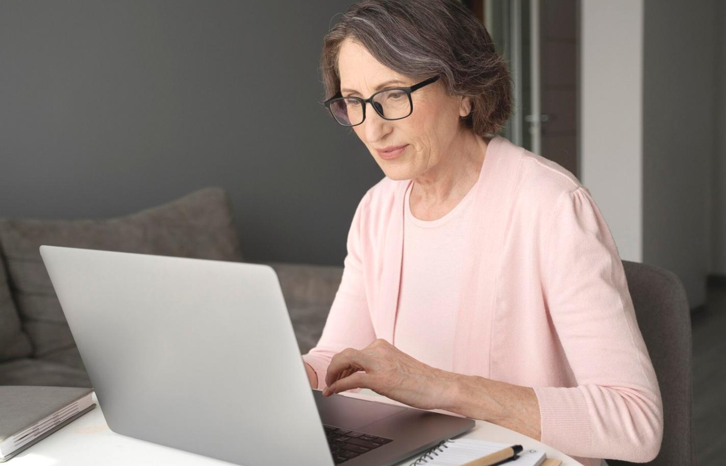 Financial planning workspace with calculator, charts, and budget documents