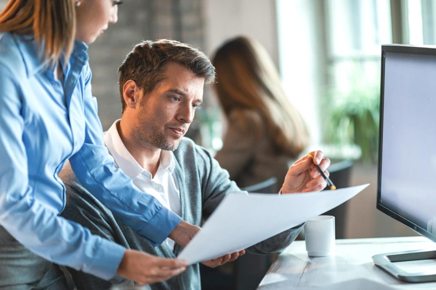 Professional financial planning workspace with documents and tools